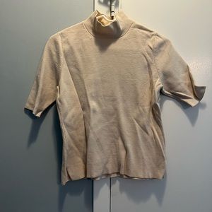 Off white turtleneck knit top